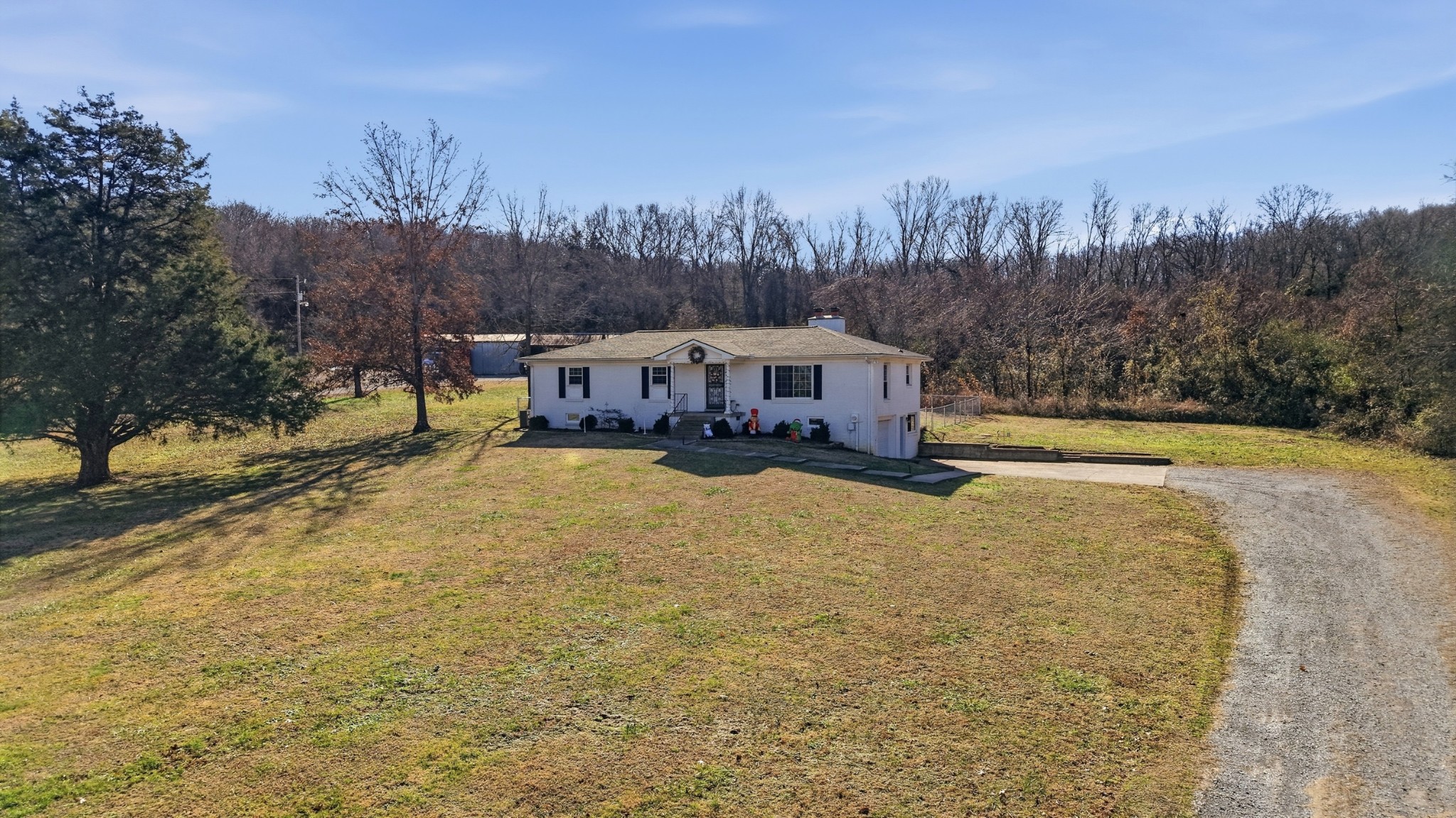 650 County Farm Road Murfreesboro, TN 37127 - Photo 2 of 45 a view of swimming pool with trees in the background