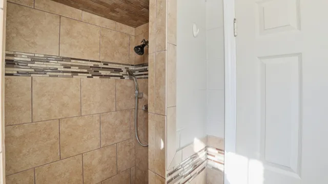 a close view of a bathroom shower