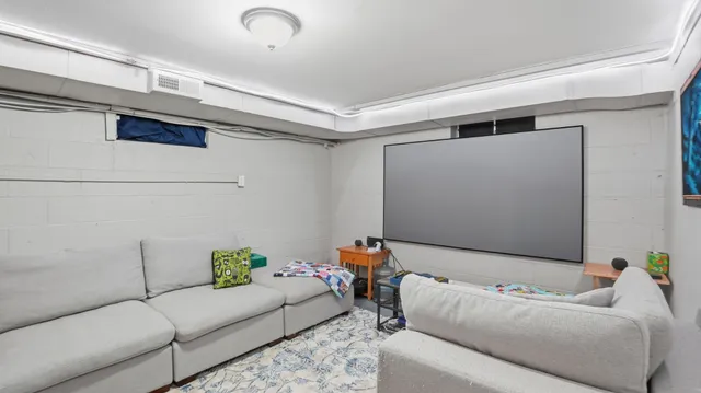 a living room with furniture and a couch