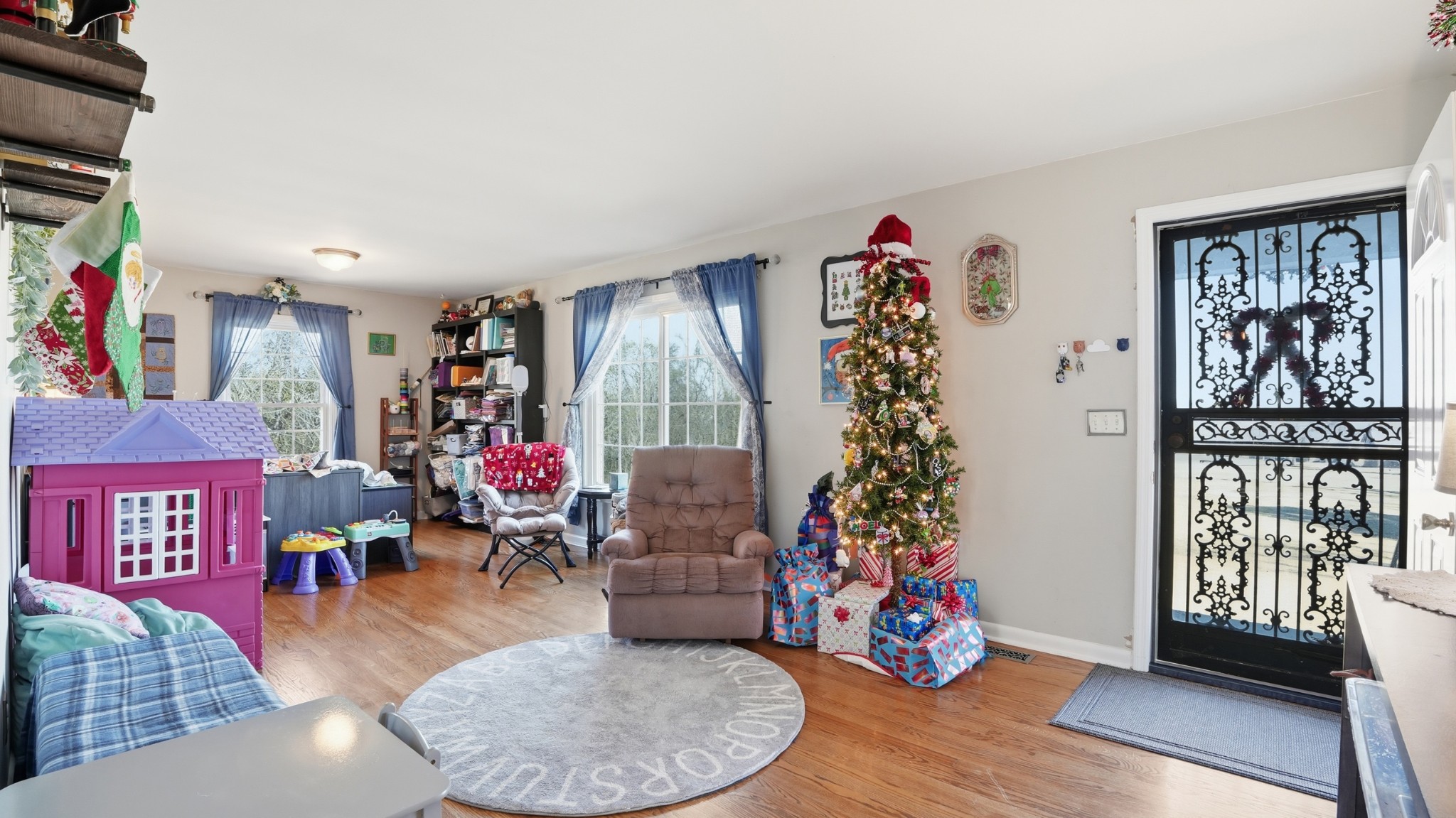 650 County Farm Road Murfreesboro, TN 37127 - Photo 5 of 45 a living room with furniture stairs and a window