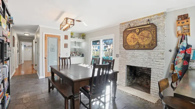 a view of a livingroom with furniture and a fireplace