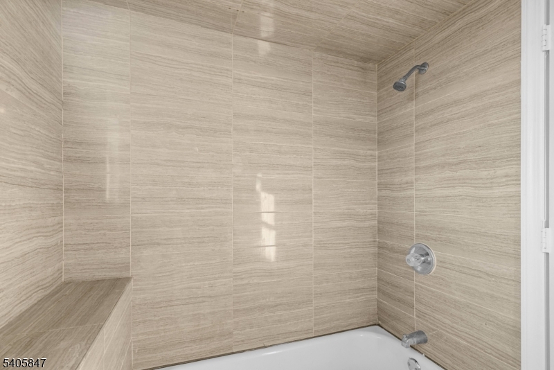 219 Clinton Place Newark, NJ 07112 - Photo 16 of 21 a bathroom with a shower