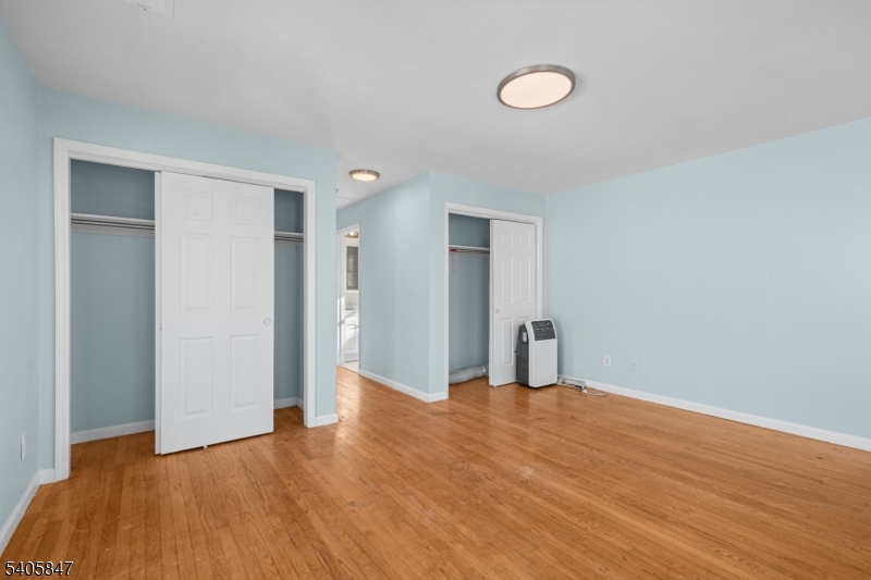 219 Clinton Place Newark, NJ 07112 - Photo 10 of 21 a view of empty room with wooden floor