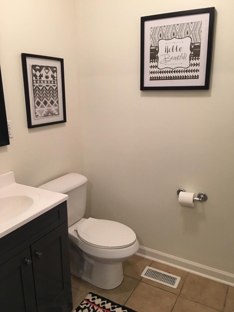 183 Midkiff Road Southeast Floyd, VA 24091 - Photo 14 of 35 a bathroom with a toilet and a sink