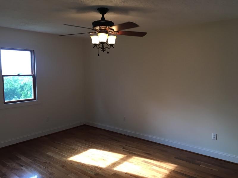 183 Midkiff Road Southeast Floyd, VA 24091 - Photo 18 of 35 an empty room with a window