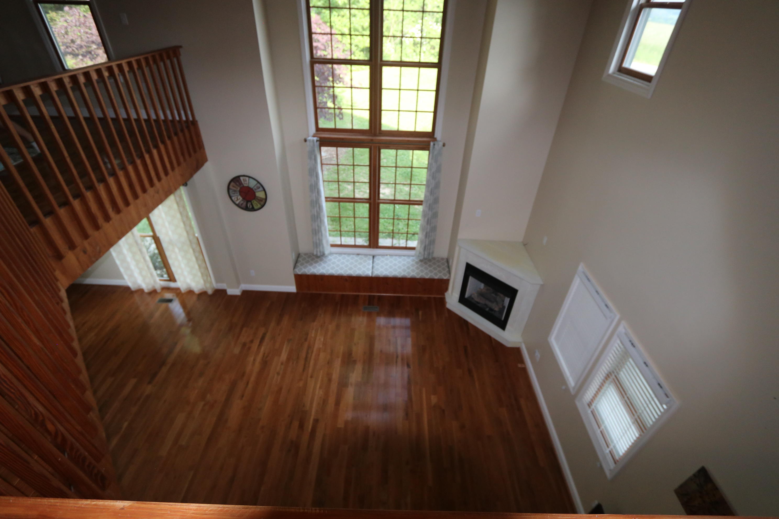 183 Midkiff Road Southeast Floyd, VA 24091 - Photo 30 of 35 a view of empty room with wooden floor and fan