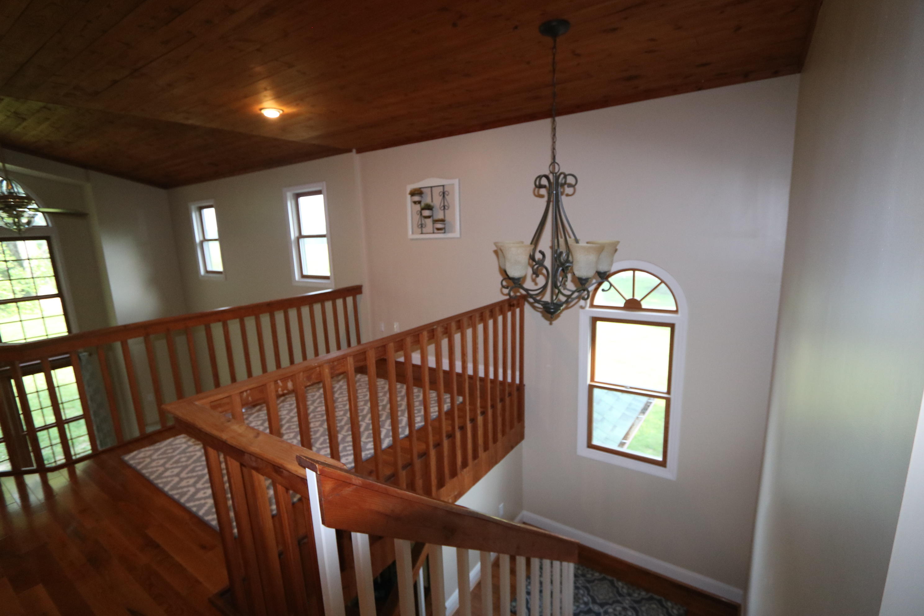 183 Midkiff Road Southeast Floyd, VA 24091 - Photo 31 of 35 a view of entryway with a window and wooden floor