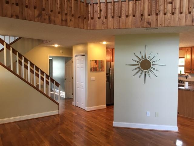 183 Midkiff Road Southeast Floyd, VA 24091 - Photo 9 of 35 a view of hallway with a window and wooden floor