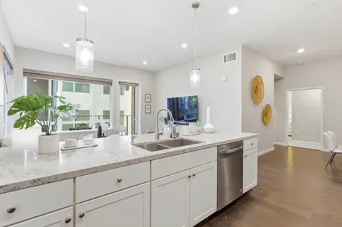 a bathroom with a toilet a sink and a bathtub