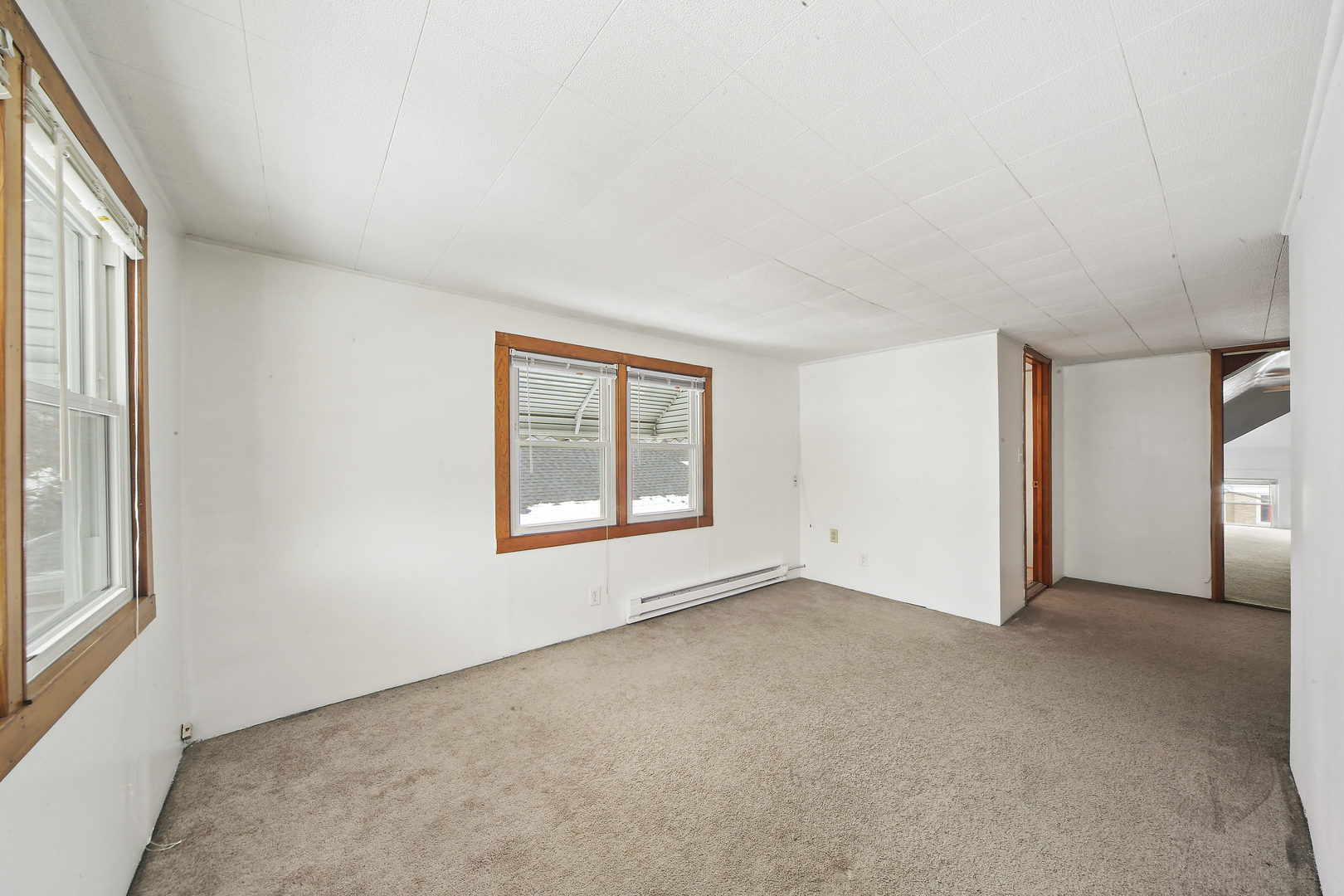 225 East Quincy Street Riverside, IL 60546 - Photo 15 of 32 an empty room with windows and closet
