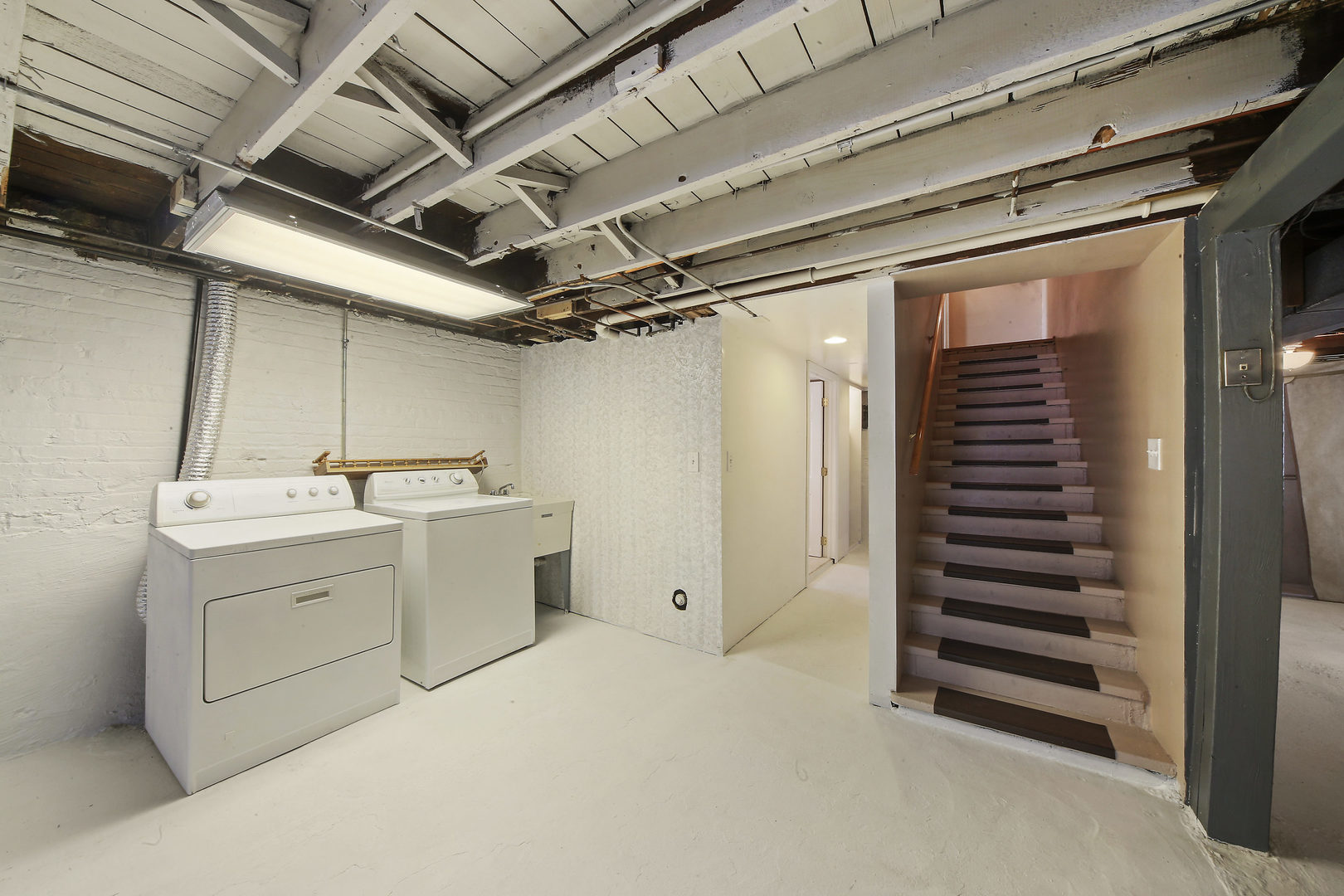 225 East Quincy Street Riverside, IL 60546 - Photo 19 of 32 a utility room with dryer and washer