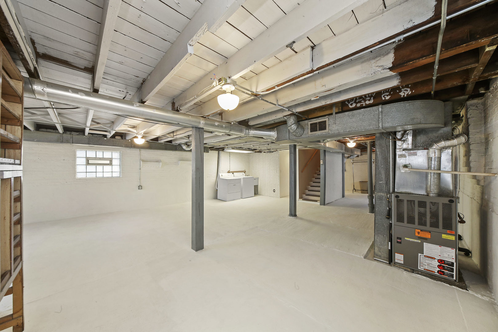 225 East Quincy Street Riverside, IL 60546 - Photo 22 of 32 a view of an empty room with gym equipment