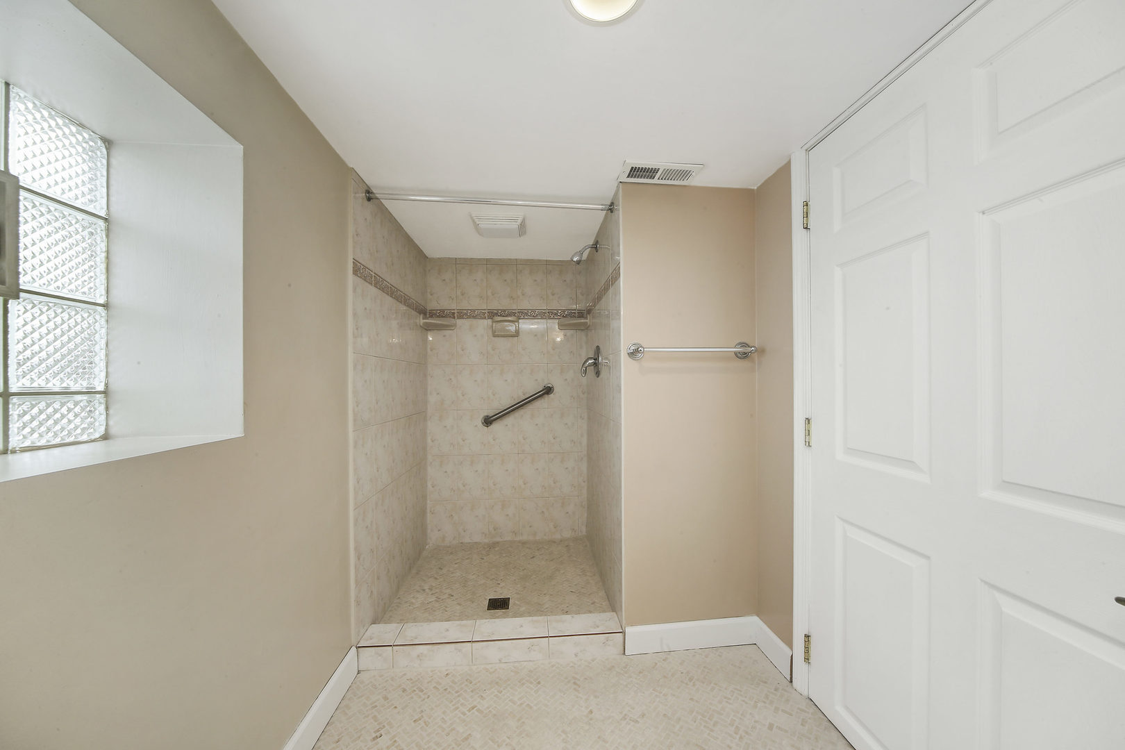 225 East Quincy Street Riverside, IL 60546 - Photo 24 of 32 a bathroom with a shower