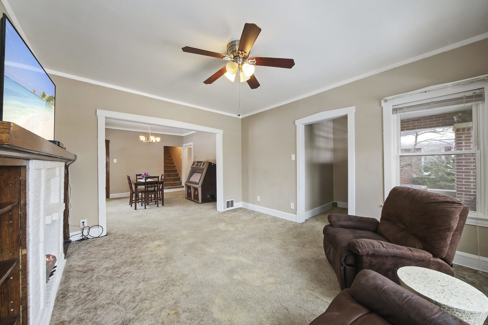 225 East Quincy Street Riverside, IL 60546 - Photo 6 of 32 a living room with furniture and a window