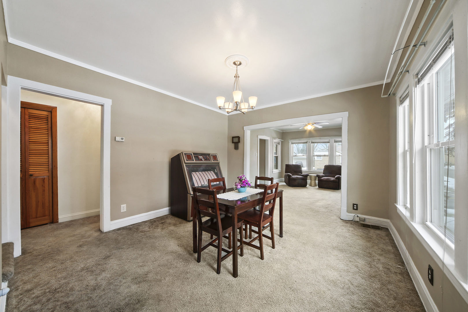 225 East Quincy Street Riverside, IL 60546 - Photo 8 of 32 a view of a dining room with furniture window and outside view