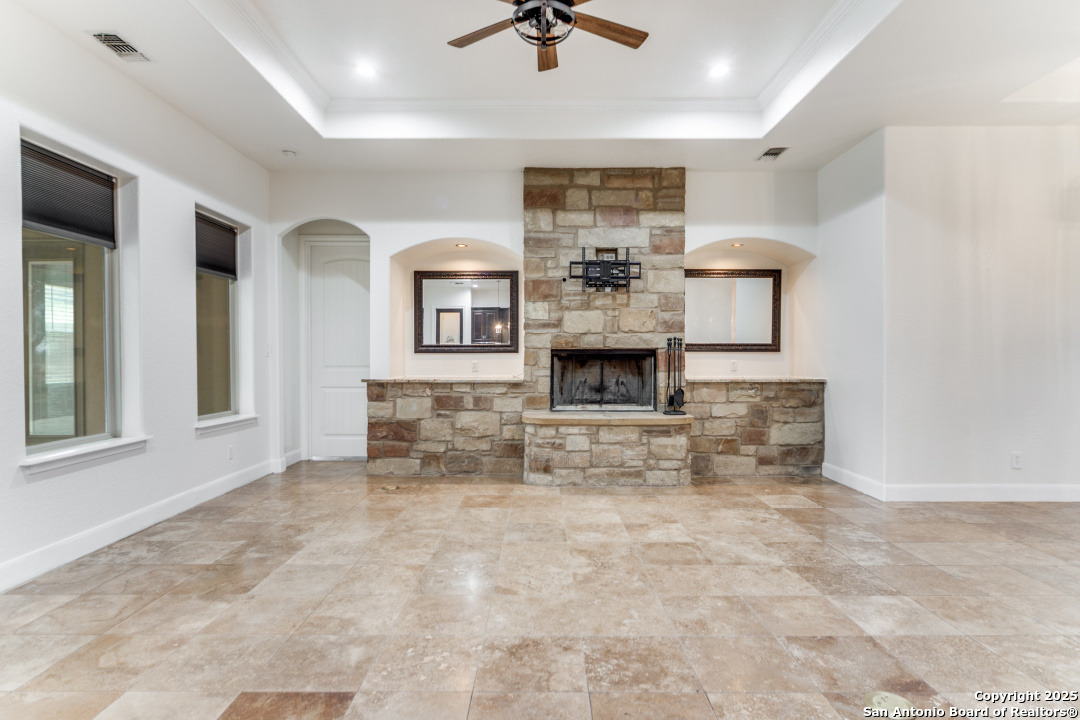 1118 Springfield Drive Spring Branch, TX 78070 - Photo 2 of 31 a living room with furniture and a fireplace