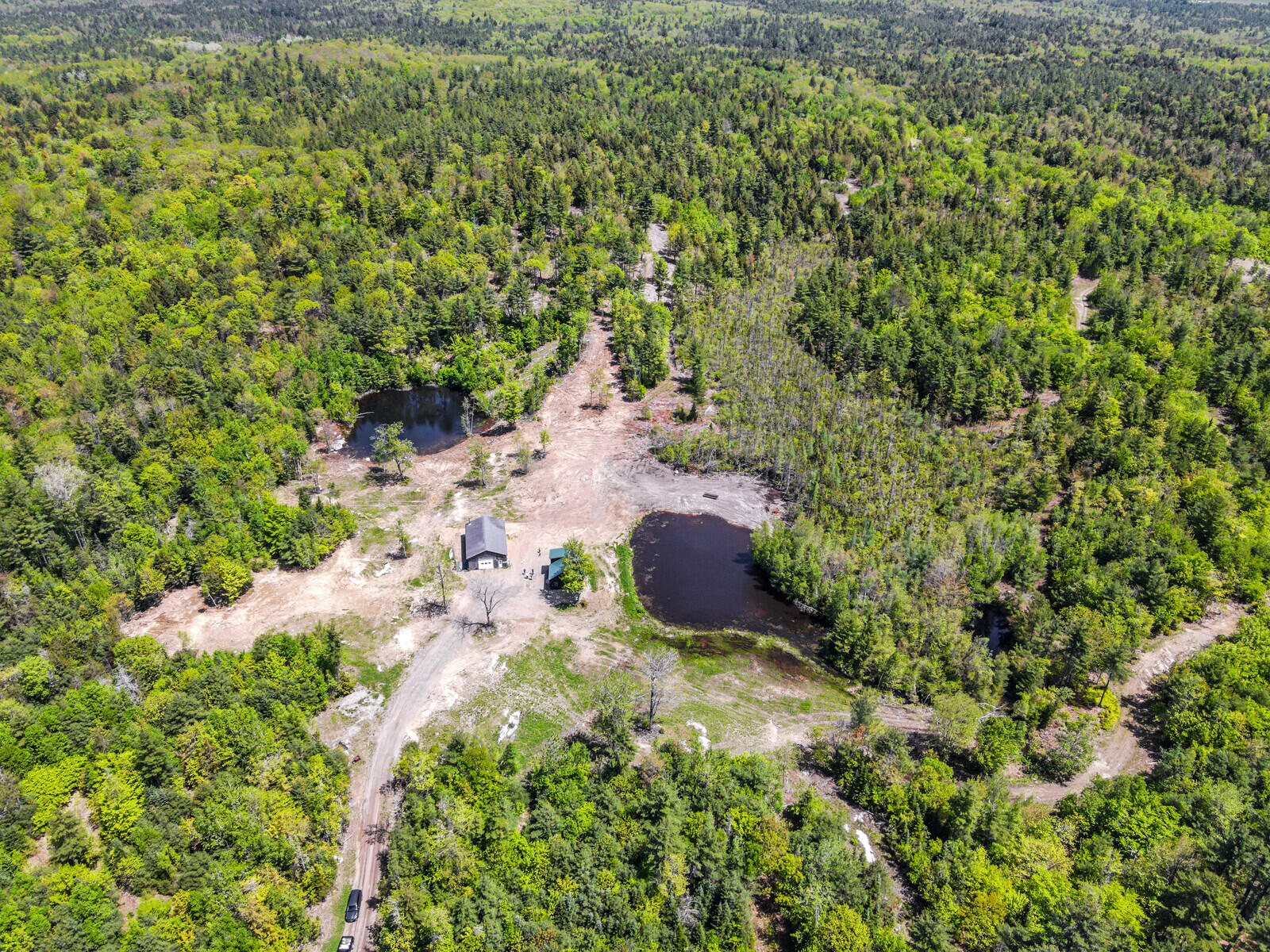 1015 Colby Road Palermo, ME 04354 - Photo 22 of 35 Driveway cabin and garage from above
