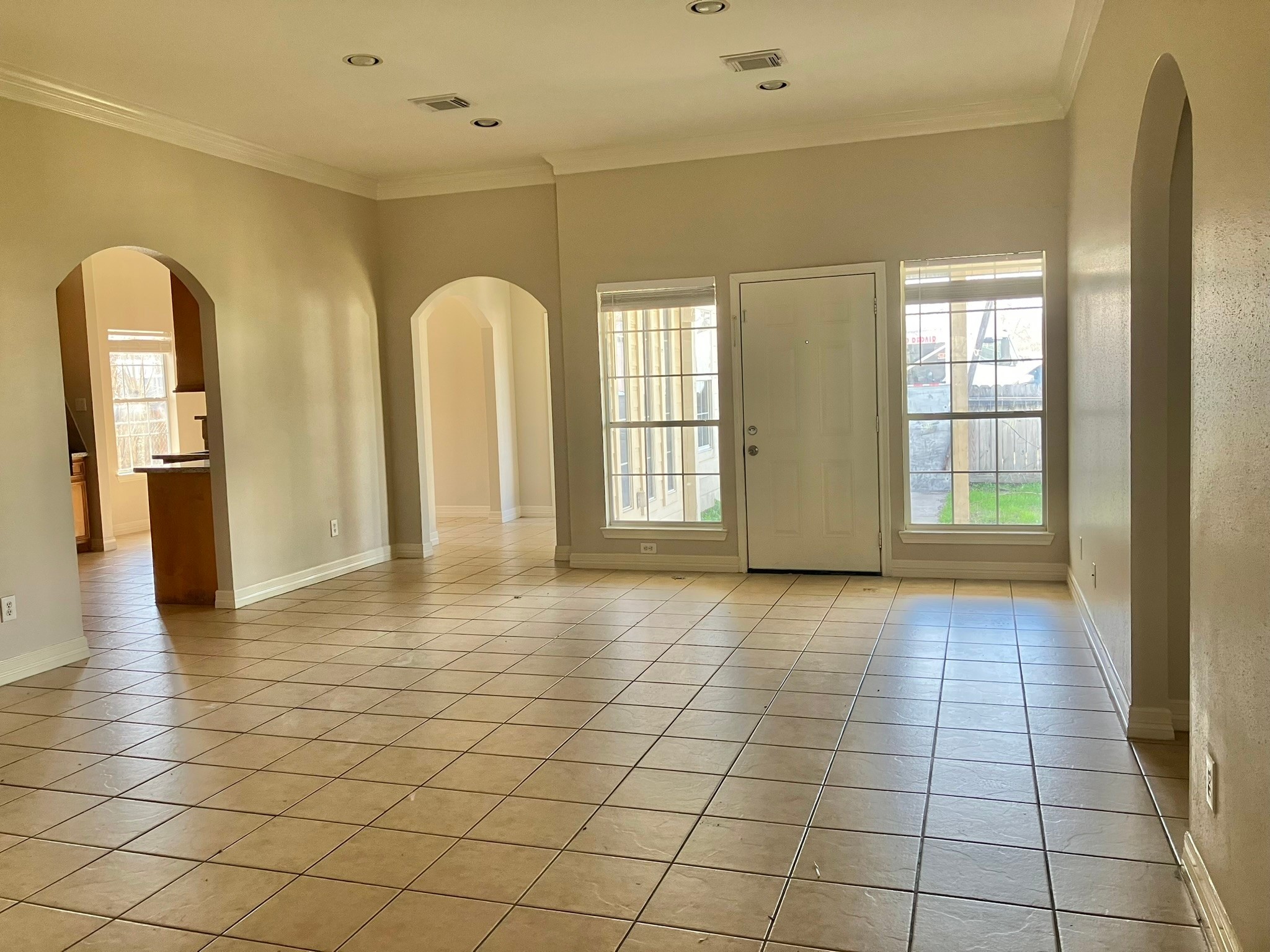 6309 East Houston Road Houston, TX 77028 - Photo 5 of 17 a view of an empty room with glass door