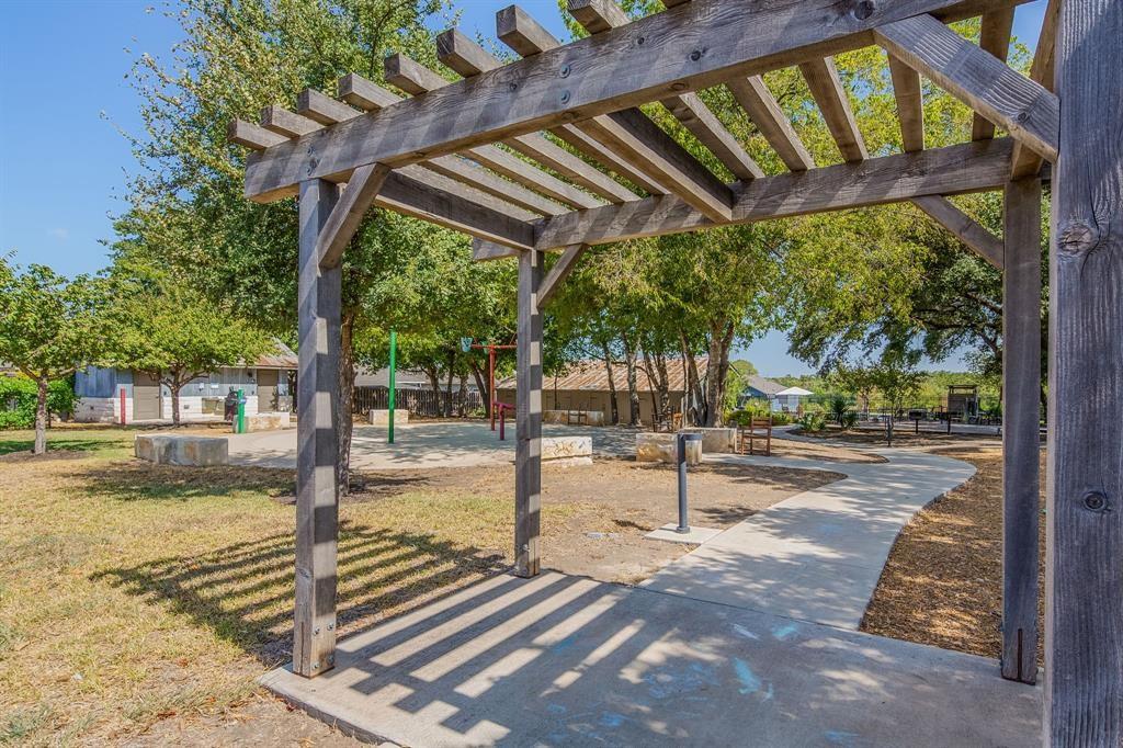 1501 Gropius Lane, Unit 30B Pflugerville, TX 78660 - Photo 28 of 30 View of community with a pergola and a lawn