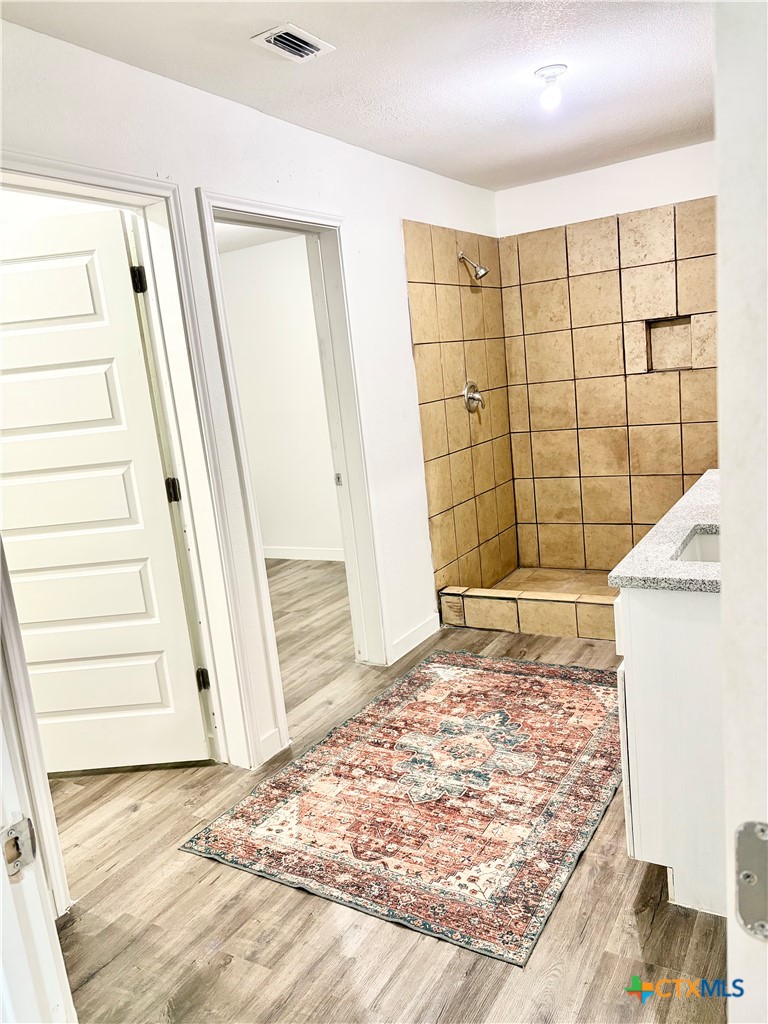 950 Highsmith Road Luling, TX 78648 - Photo 12 of 36 a view of wooden floor