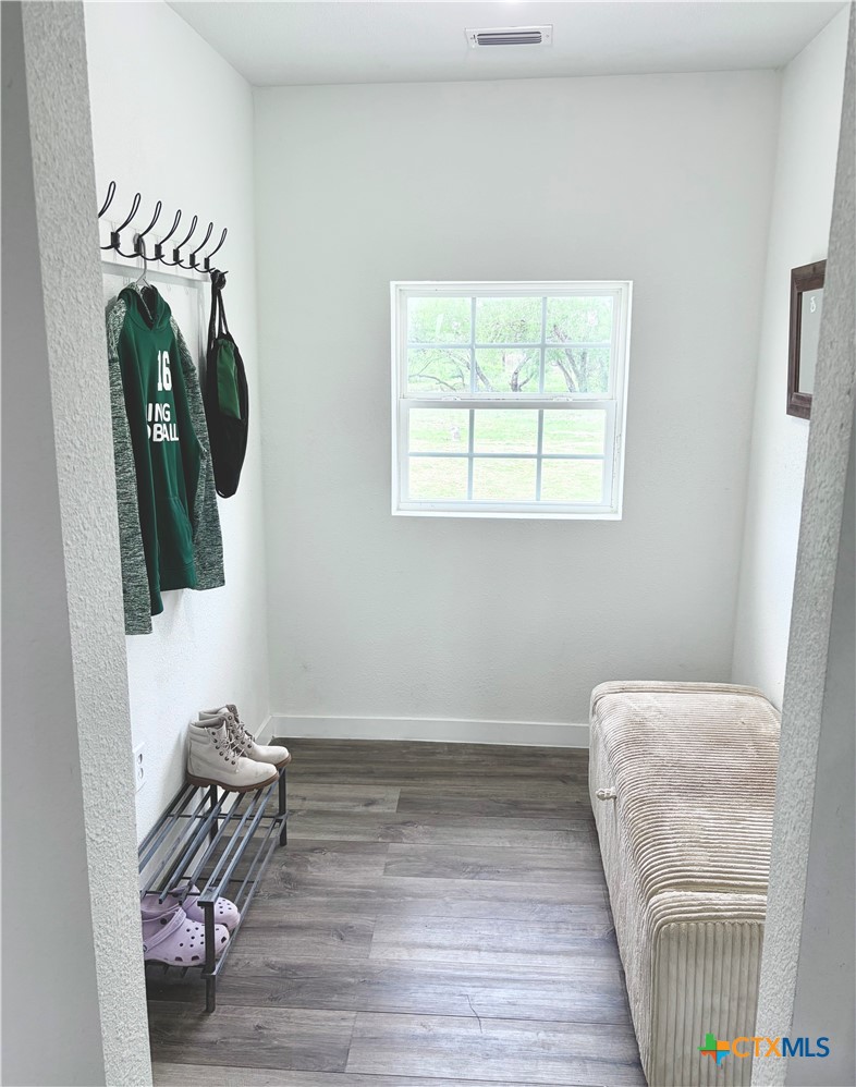 950 Highsmith Road Luling, TX 78648 - Photo 8 of 36 a bedroom with a bed and a window