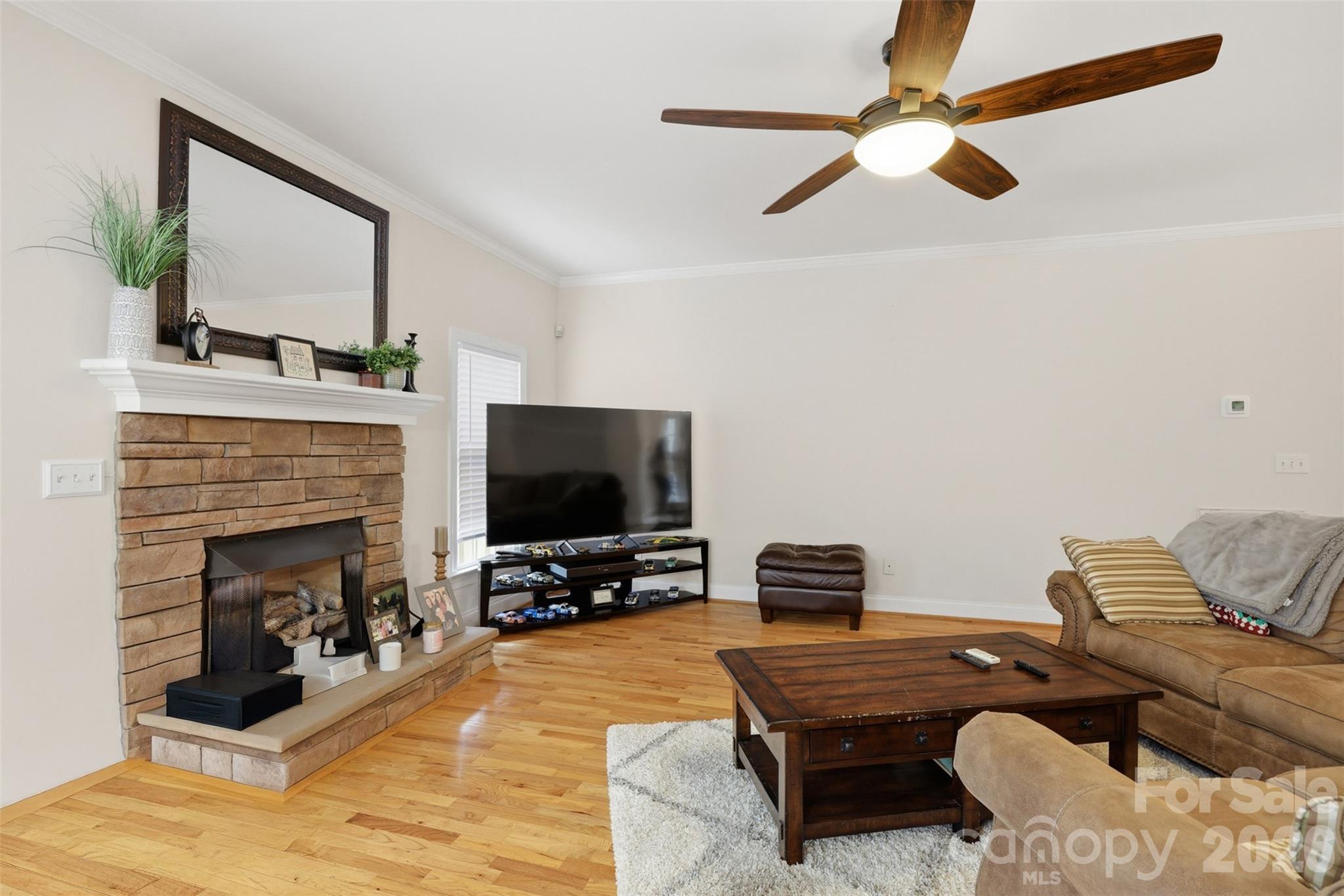 7594 Church Road Taylorsville, NC 28681 - Photo 20 of 34 a living room with furniture and a flat screen tv