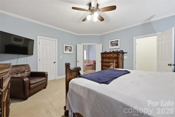 a bedroom with a bed and furniture