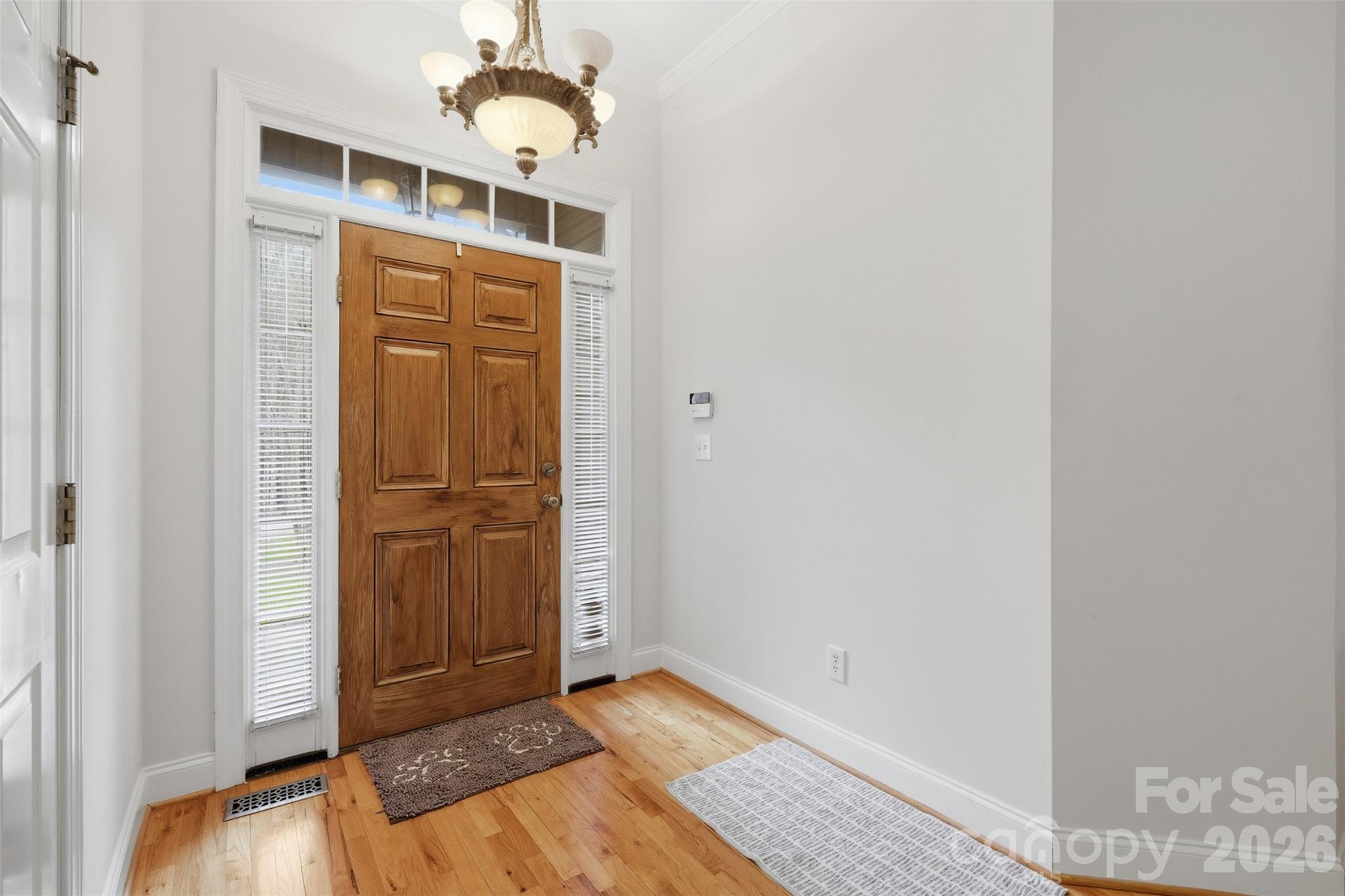 7594 Church Road Taylorsville, NC 28681 - Photo 26 of 34 an empty room with wooden floor closet and windows