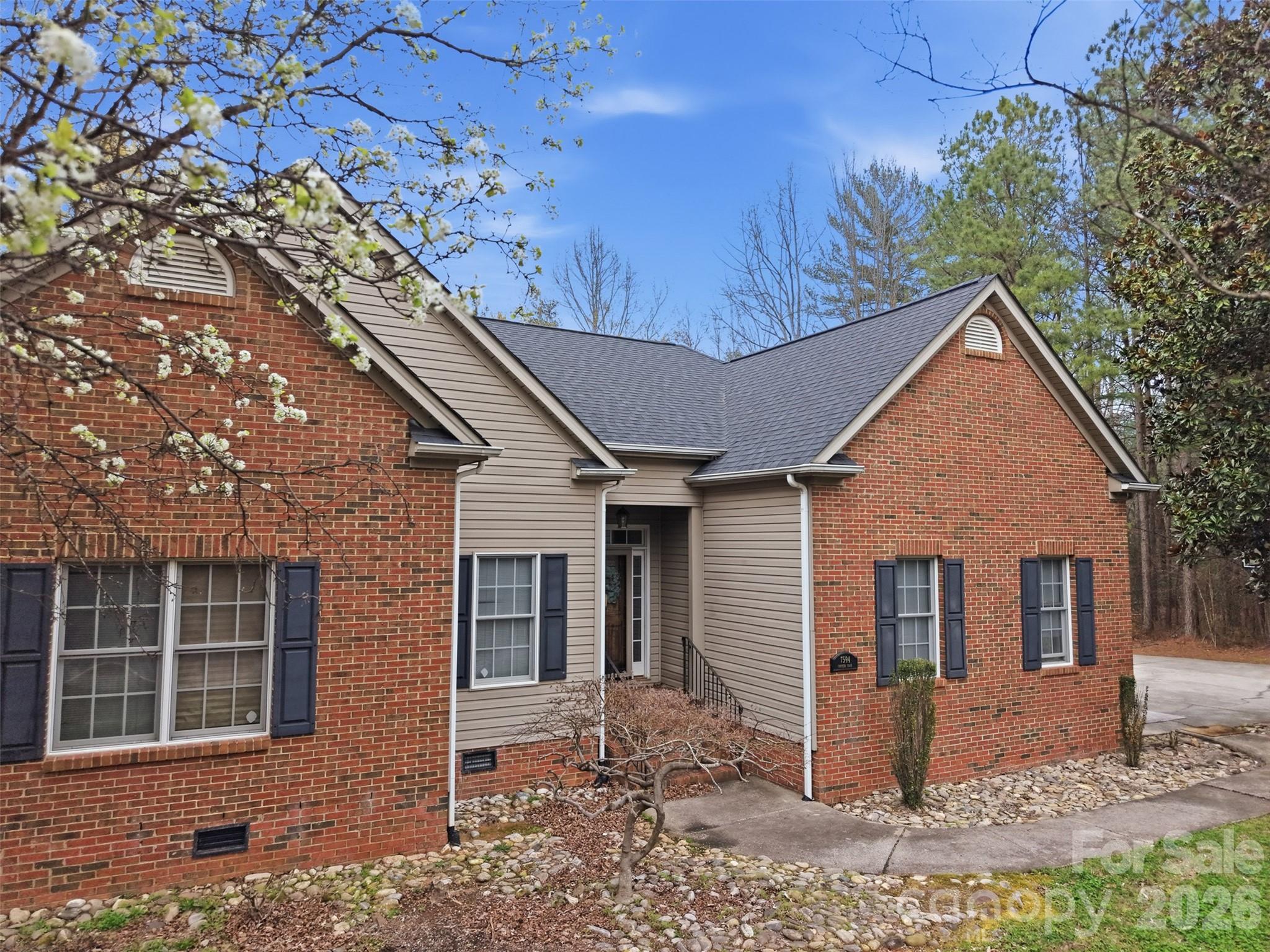 7594 Church Road Taylorsville, NC 28681 - Photo 3 of 34 a front view of a house with a yard