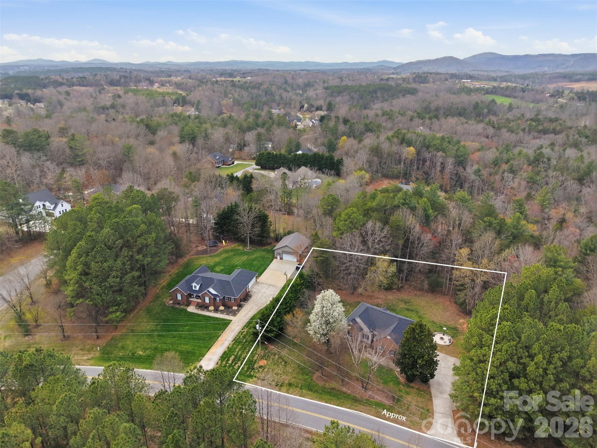 7594 Church Road Taylorsville, NC 28681 - Photo 31 of 34 an aerial view of a garden with mountain view