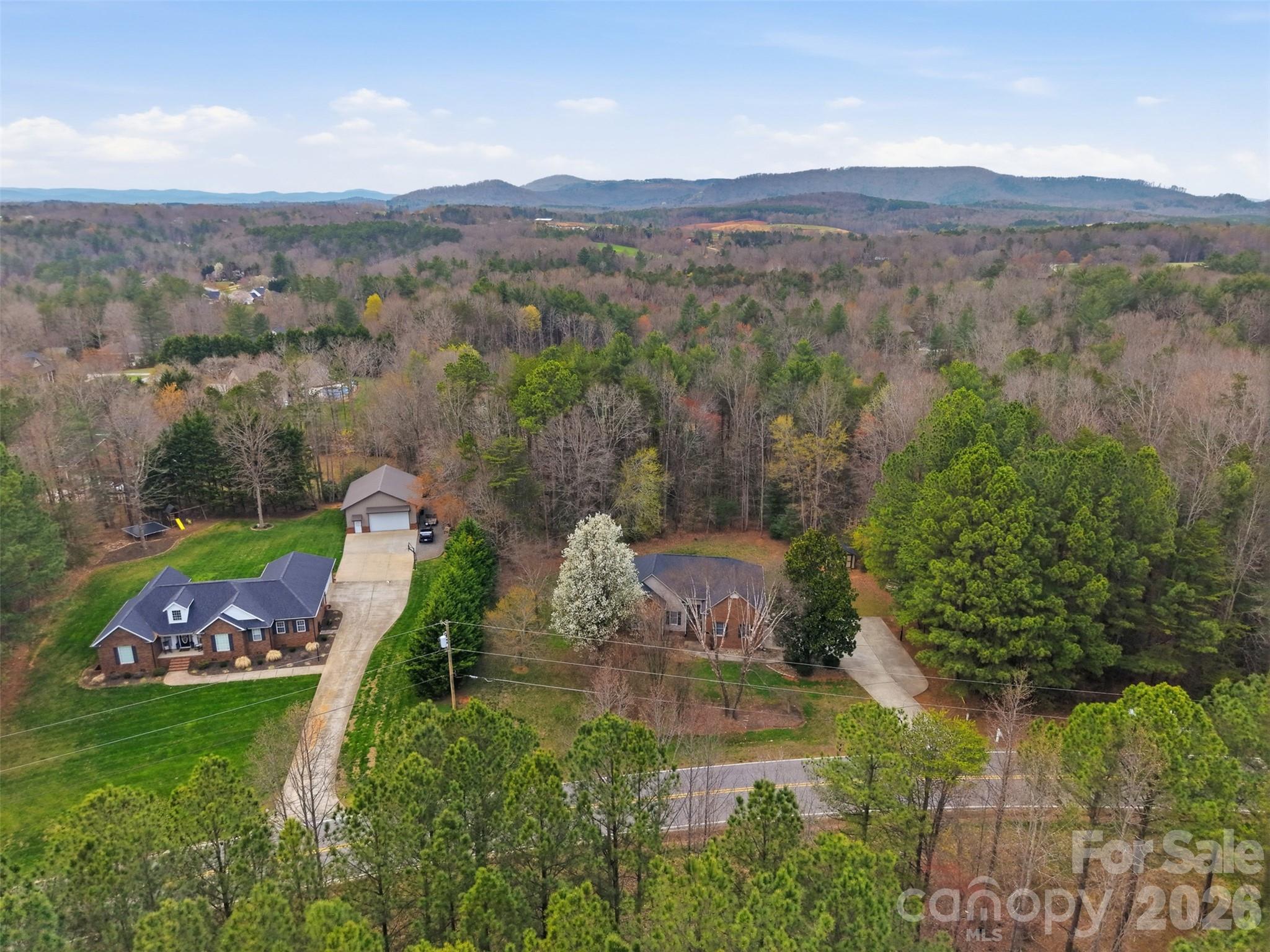 7594 Church Road Taylorsville, NC 28681 - Photo 33 of 34 an aerial view of a house with outdoor space