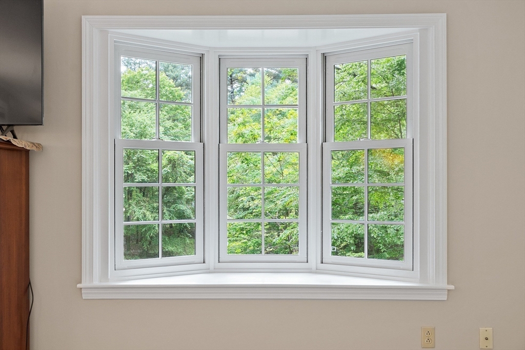 31 Spectacle Hill Road Bolton, MA 01740 - Photo 17 of 42 a view of a room that has a window in it