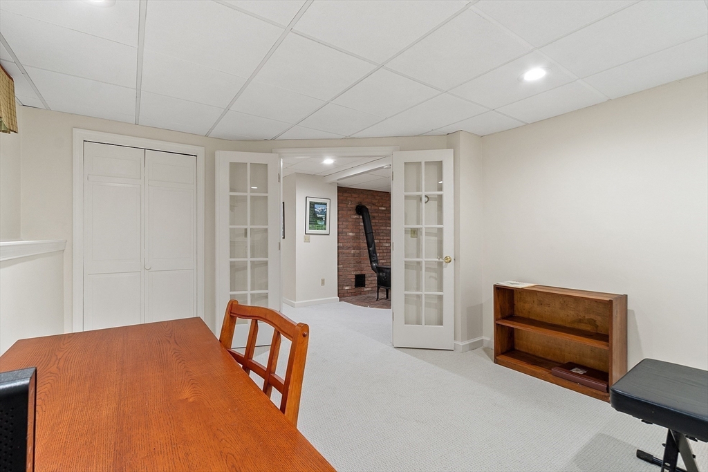 31 Spectacle Hill Road Bolton, MA 01740 - Photo 35 of 42 a bedroom with furniture and a rug