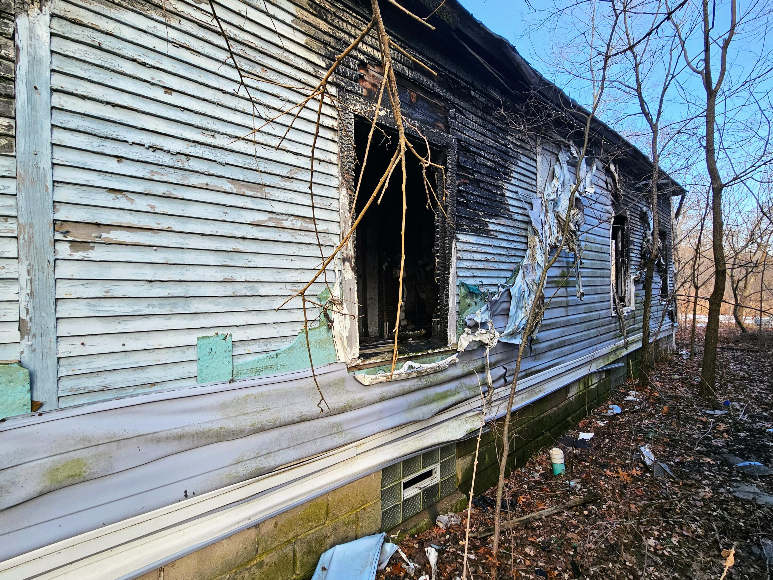 3980 Madison Street Gary, IN 46408 - Photo 2 of 6 a view of backyard with small cabin