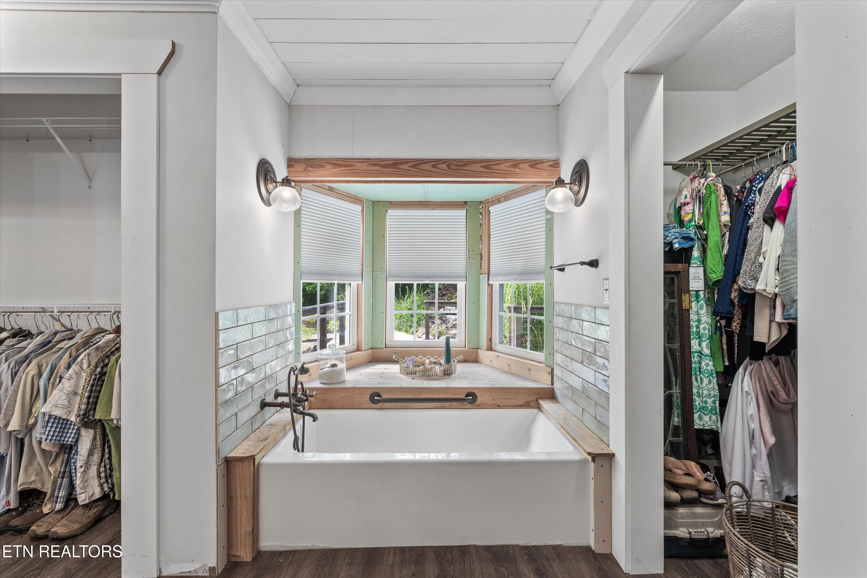 976 Lone Road Pioneer, TN 37847 - Photo 22 of 40 soaking tub with his/her closets