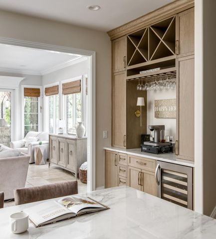 a living room with fireplace furniture and a flat screen tv
