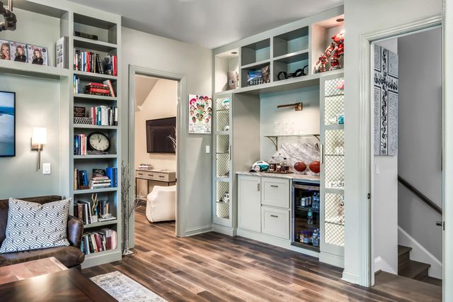 a swimming pool with outdoor seating yard and barbeque oven