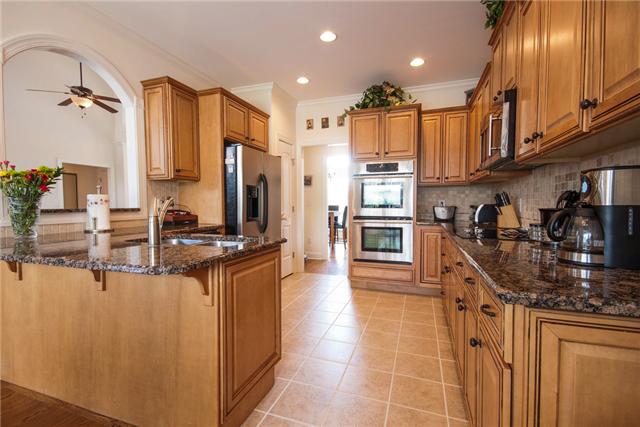 1228 White Rock Road Spring Hill, TN 37174 - Photo 7 of 20 Kitchen with granite counters