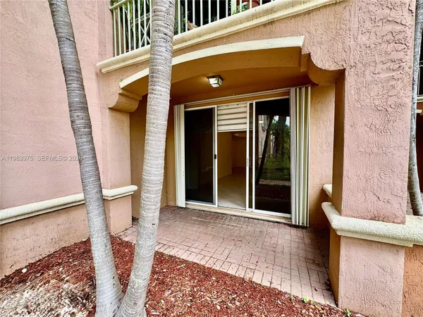 a kitchen with a sink cabinets and stainless steel appliances