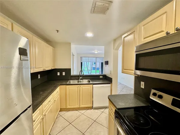 a view of empty room with windows