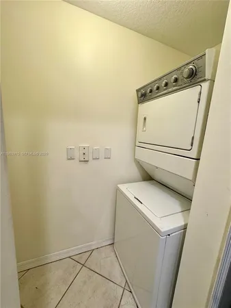 a bathroom with a sink a mirror and a bathtub