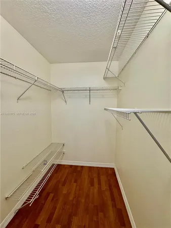 a front view of multiple houses with yard