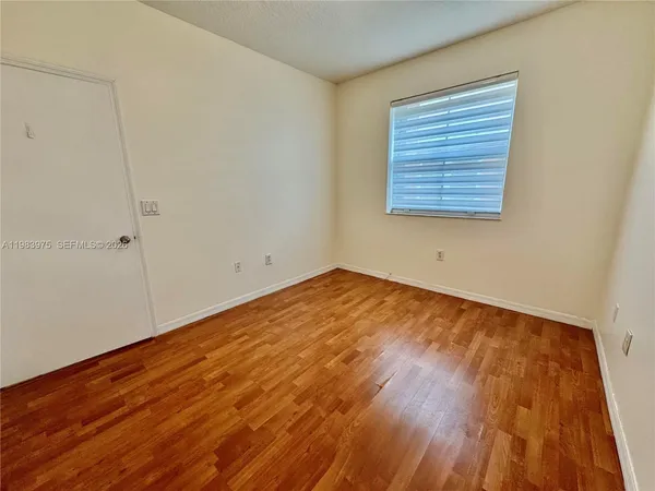 a view of a lake with a nearby beach