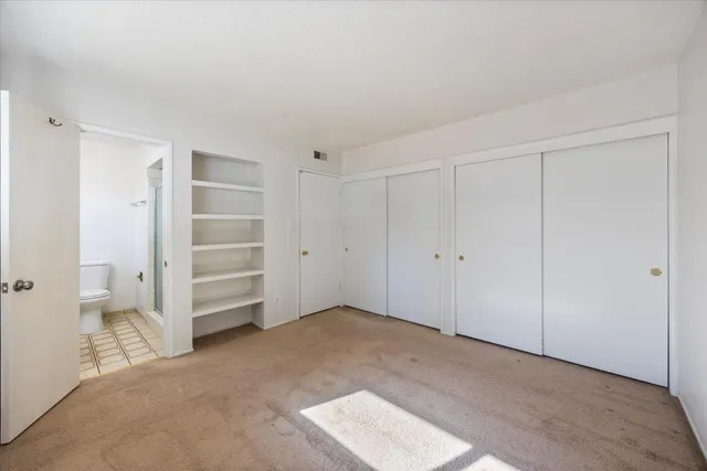 a view of room with walk in closet