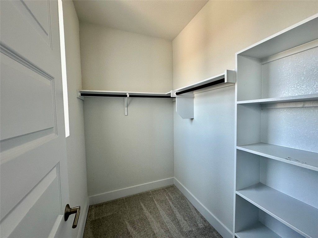 8600 Cumbrae Lane Austin, TX 78744 - Photo 11 of 29 Spacious closet with light carpet