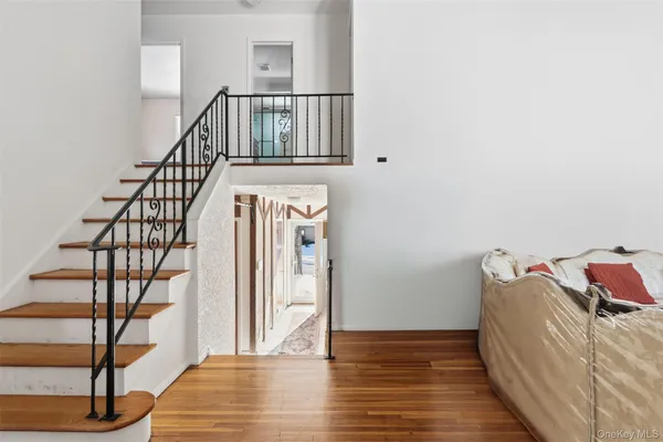 a view of entryway with wooden floor