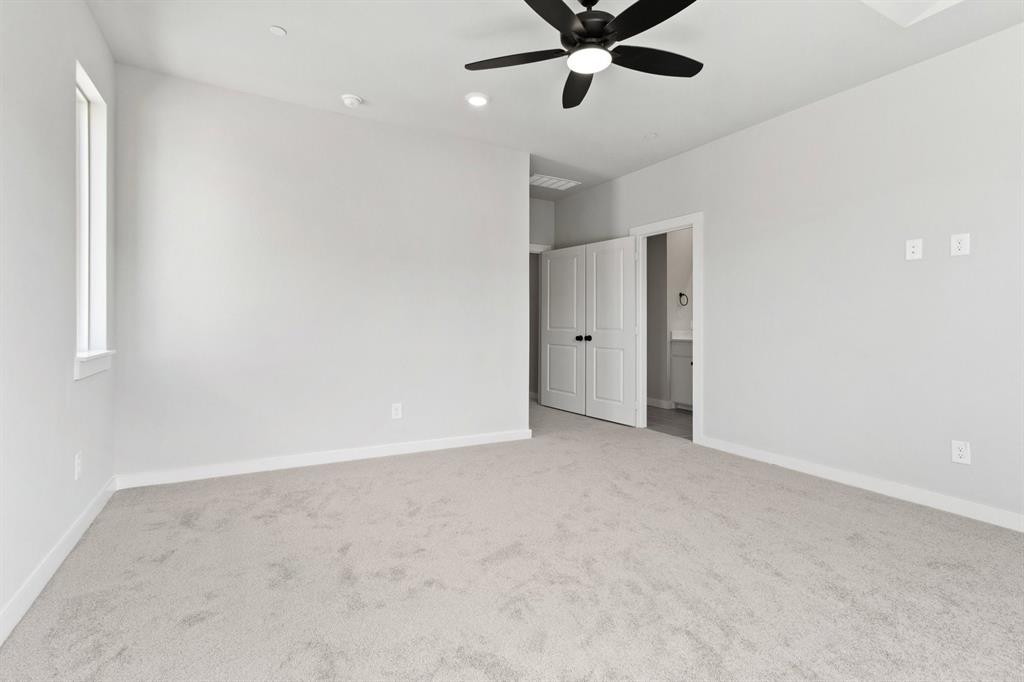 2020 Aldrich Road Celina, TX 75009 - Photo 21 of 40 an empty room with a ceiling fan and window
