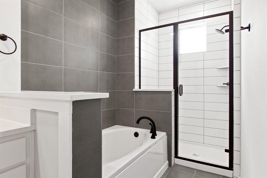2020 Aldrich Road Celina, TX 75009 - Photo 25 of 40 a bathroom with a bathtub and next to a window