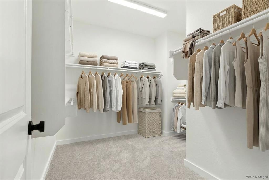 2020 Aldrich Road Celina, TX 75009 - Photo 29 of 40 a view of walk in closet with clothes and shoes