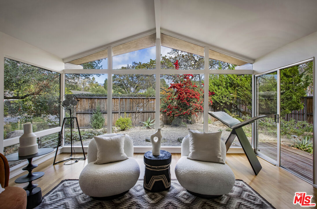 921 North San Marcos Road Santa Barbara, CA 93111 - Photo 14 of 44 a living room with furniture and a large window
